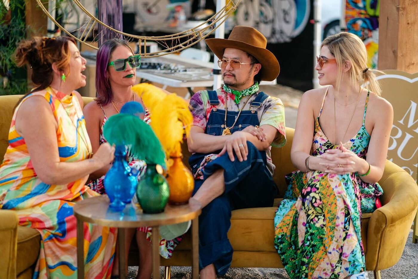 Friends relax at a cannabis brand lounge at the inaugural fair