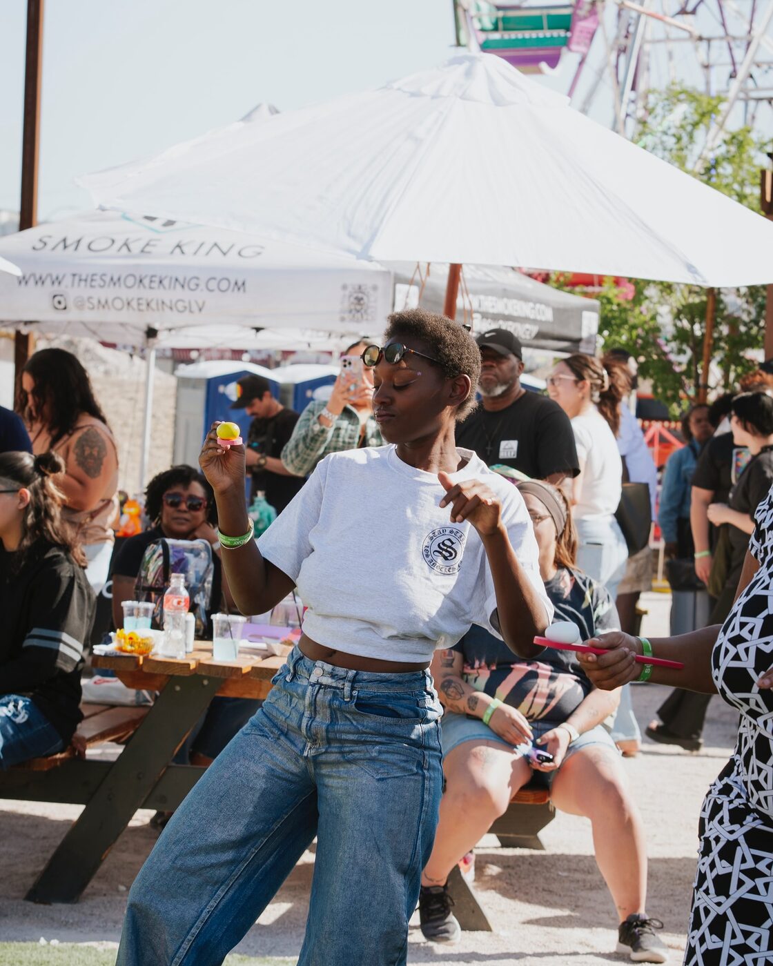 Guests browse a vendor booth in the NuWu courtyard