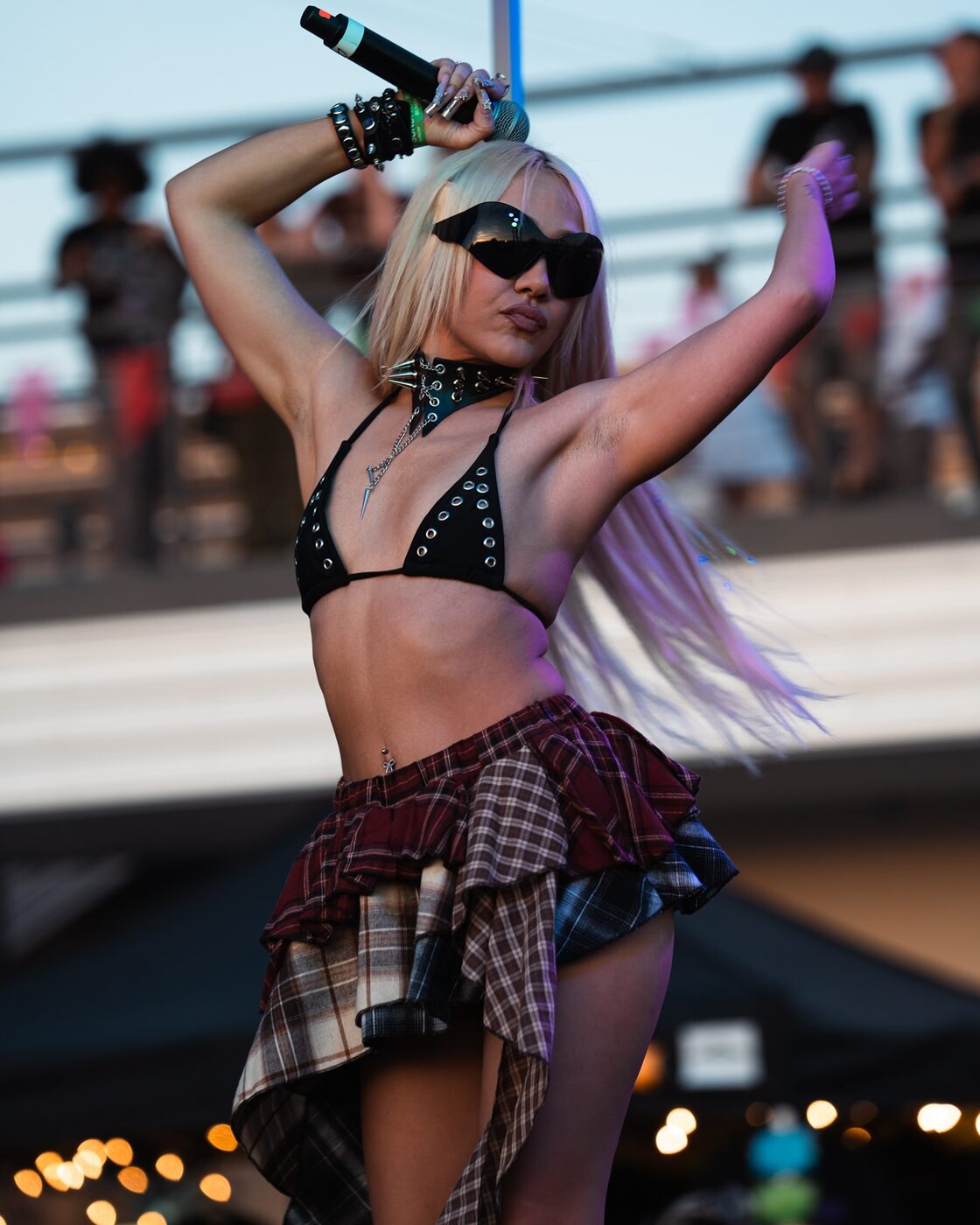 A performer commands the main stage after dark