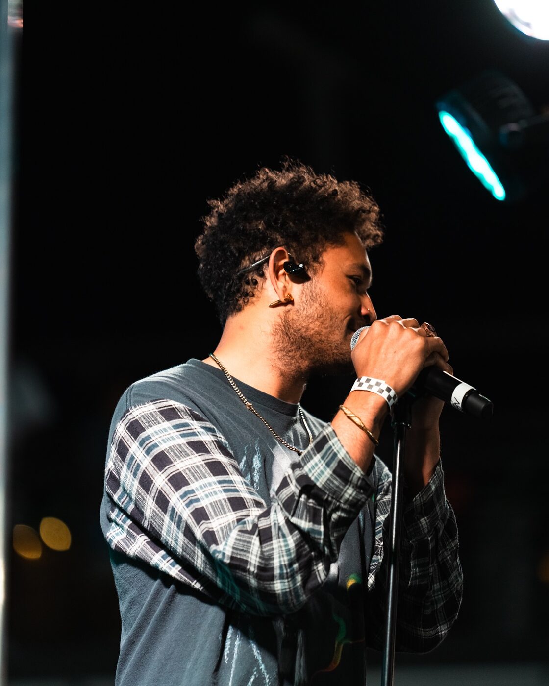 A vocalist works the mic as the night ramps up